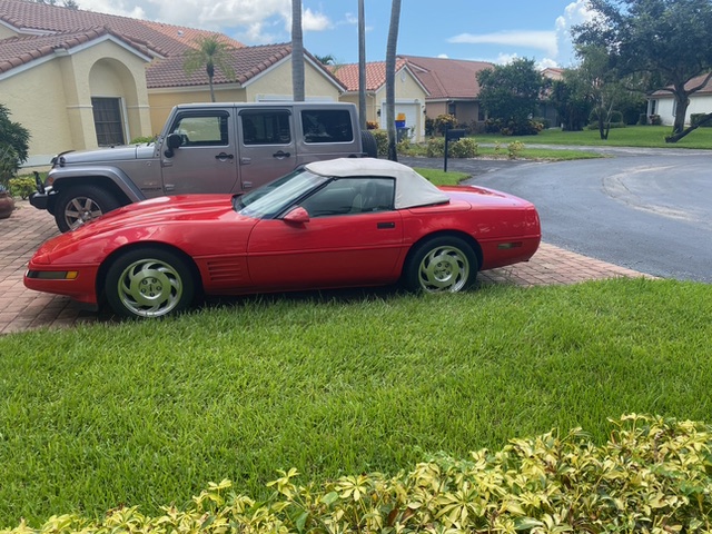 1994 red Chevy Corvette Convertible
